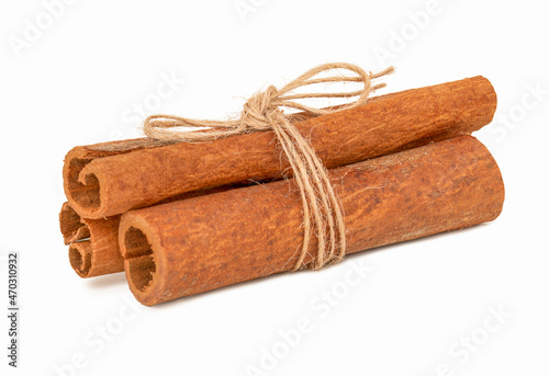 cinnamon tied with rope isolated on white background