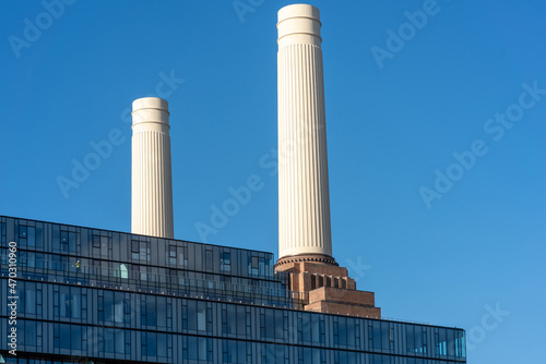 Chimneys of Battersea Power station against blue sky, London, UK