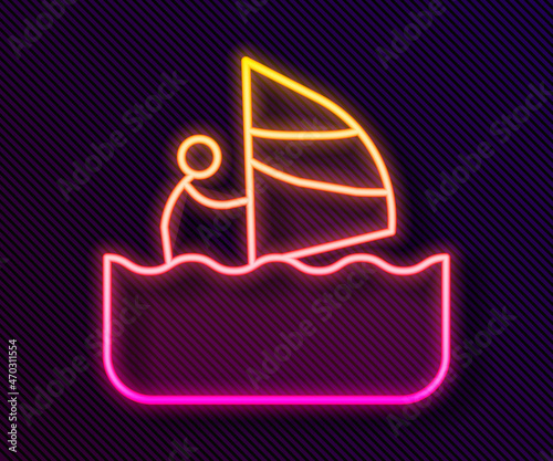 Glowing neon line Windsurfing icon isolated on black background. Vector