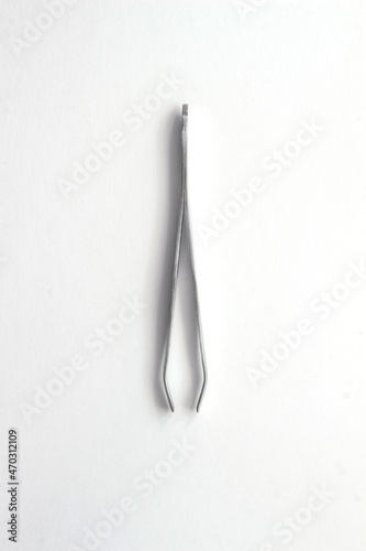 manicure tweezers isolated on white background. High quality photo