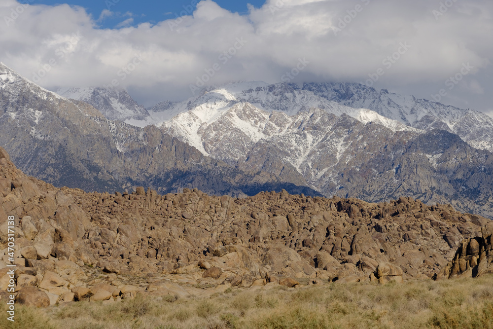 The large Granite Outcrops, rocks and spires in a stone desert surrounded by the Sierra Mountains of Eastern California The large Granite Outcrops, rocks and spires in a stone desert surrounded by the Sierra Mountains of Eastern California