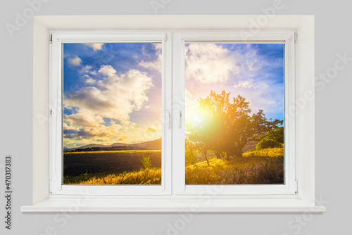 Window view of a beautiful mountain landscape with trees