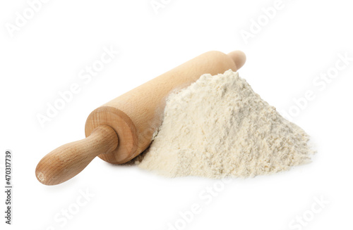 Wooden rolling pin and flour on white background