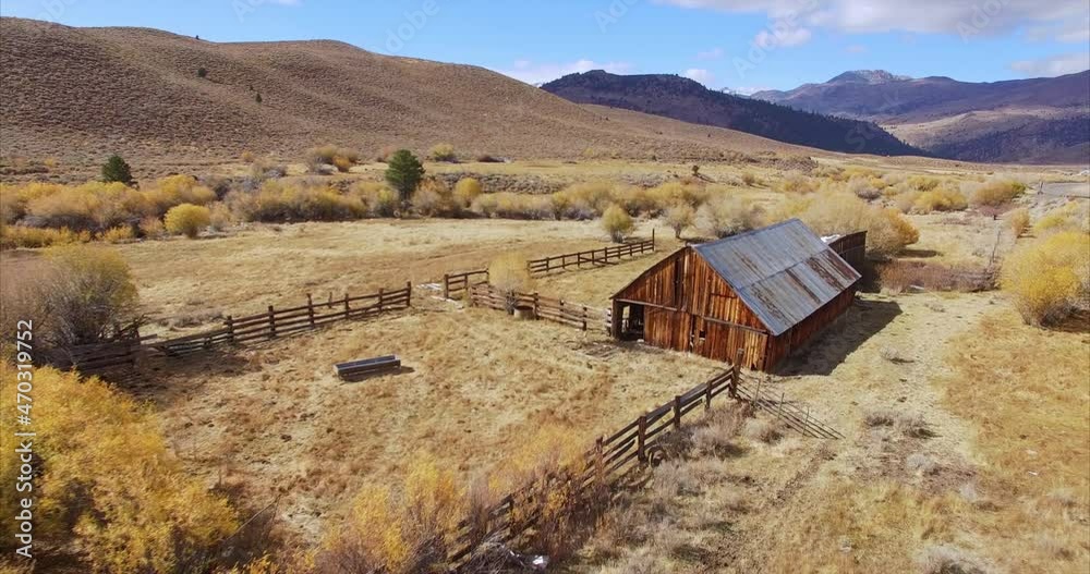 Aerial of old abandoned western barn on a ranch
