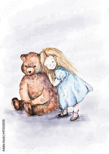 Cute little girl hugs teddy bear