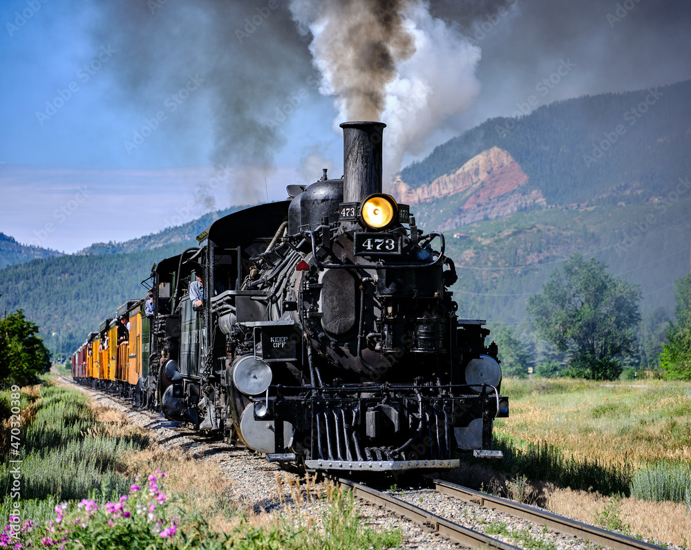 The narrow gauge railroad locomotive under power between Durango and Silverton in Colorado The narrow gauge railroad locomotive under power between Durango and Silverton in Colorado