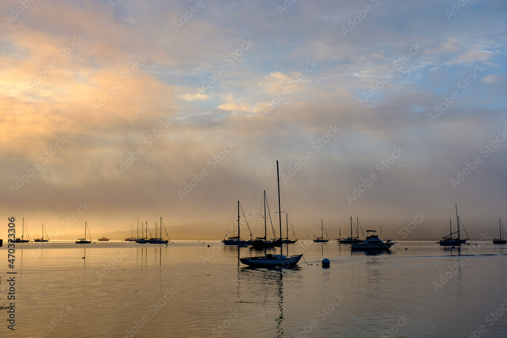 Foggy morning over Rockland Harbor in Maine on one of the last days of Summer