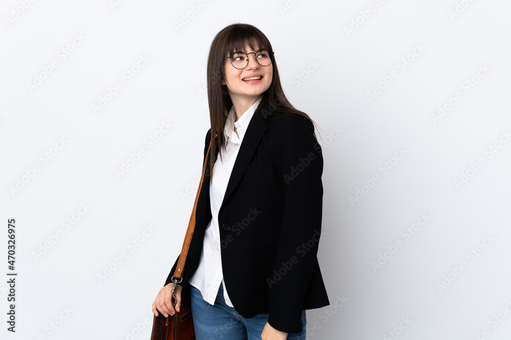 Ukranian business woman isolated on white background laughing and looking up