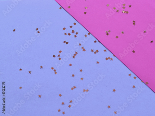 NEW YEAR and Christmas Stars background. Different colours.  Symbol of holiday. Stars.Top view flatlay . background for children's party. Design of Greeting Card With Christmas stars.
