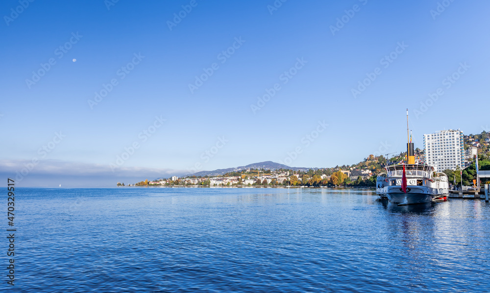 MONTREUX, SWITZERLAND - October 24, 2021: The elegant paddle wheel fleet on the lake. Pleasure boat on Lake Geneva, Switzerland.