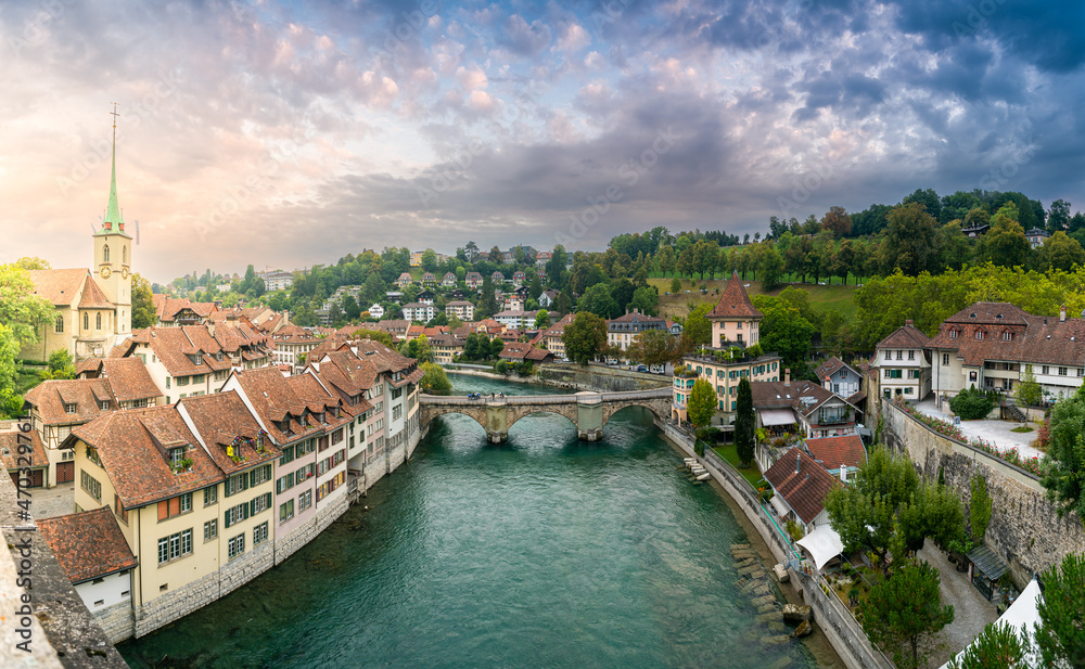 Travel to Bern. Sunrise photographed in this beautiful city from Switzerland. Photo taken next to Aare river with view to the entire old part of the town.
