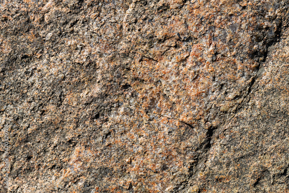 Granite stone texture. Cracked granite rock surface. Natural stone backdrop. Close-up Granite stone texture. Cracked granite rock surface. Natural stone backdrop. Close-up