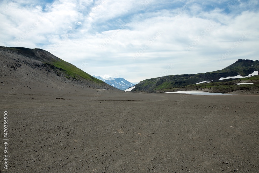 Mutnovsky is a complex volcano located in the southern part of Kamchatka Peninsula, Russia. Mutnovsky is a complex volcano located in the southern part of Kamchatka Peninsula, Russia.