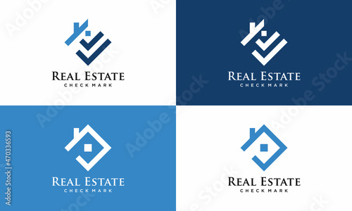 Real estate logo icon with roof and check mark graphic elements.