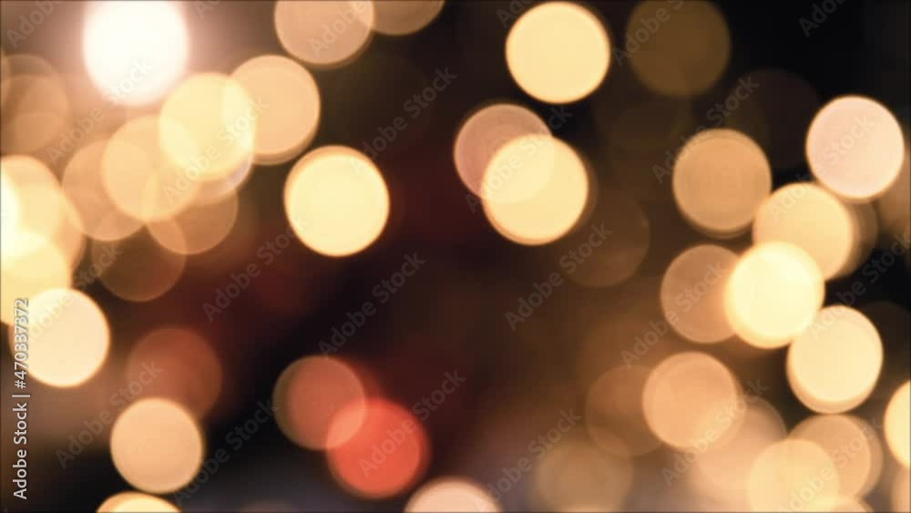 Christmas lights, shimmering abstract golden warm circles defocused. Blurred fairy lights. Out of focus holiday background. Light bokeh from Xmas tree. New Year theme, background 4k footage Christmas lights, shimmering abstract golden warm circles defocused. Blurred fairy lights. Out of focus holiday background. Light bokeh from Xmas tree. New Year theme, background 4k footage