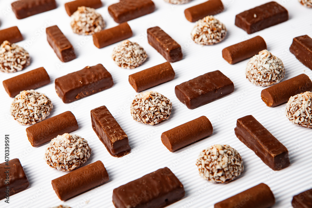 Assortment of delicious chocolate candies background. Chocolate candy isolated Assortment of delicious chocolate candies background. Chocolate candy isolated