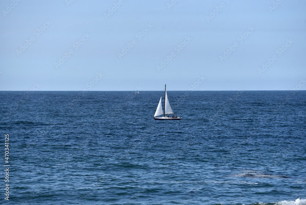 Sailboat in the Ocean on a beautiful summer day