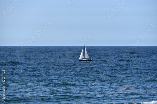 Sailboat in the Ocean on a beautiful summer day