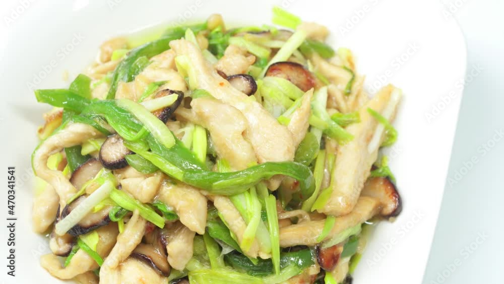 Stir-fried shredded chicken with garlic sprouts, a common home cooking in China Stir-fried shredded chicken with garlic sprouts, a common home cooking in China