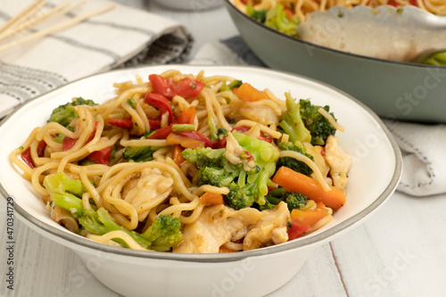 Bowl of fresh cooked chicken chow mein photo