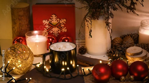 Christmas decorations, flashing lights, New Year 2022, 4k background. Xmas gift, coffee cup, red balls, candle, fir cones, bottles.