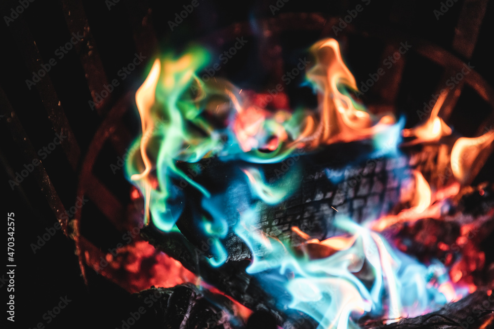Fototapeta premium Fire colored with magic powder