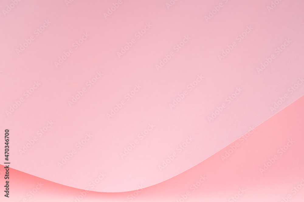 Abstract wave of pastel pink paper. Creative geometric curved paper with light and shadows. Abstract monochrome background with copy space Abstract wave of pastel pink paper. Creative geometric curved paper with light and shadows. Abstract monochrome background with copy space