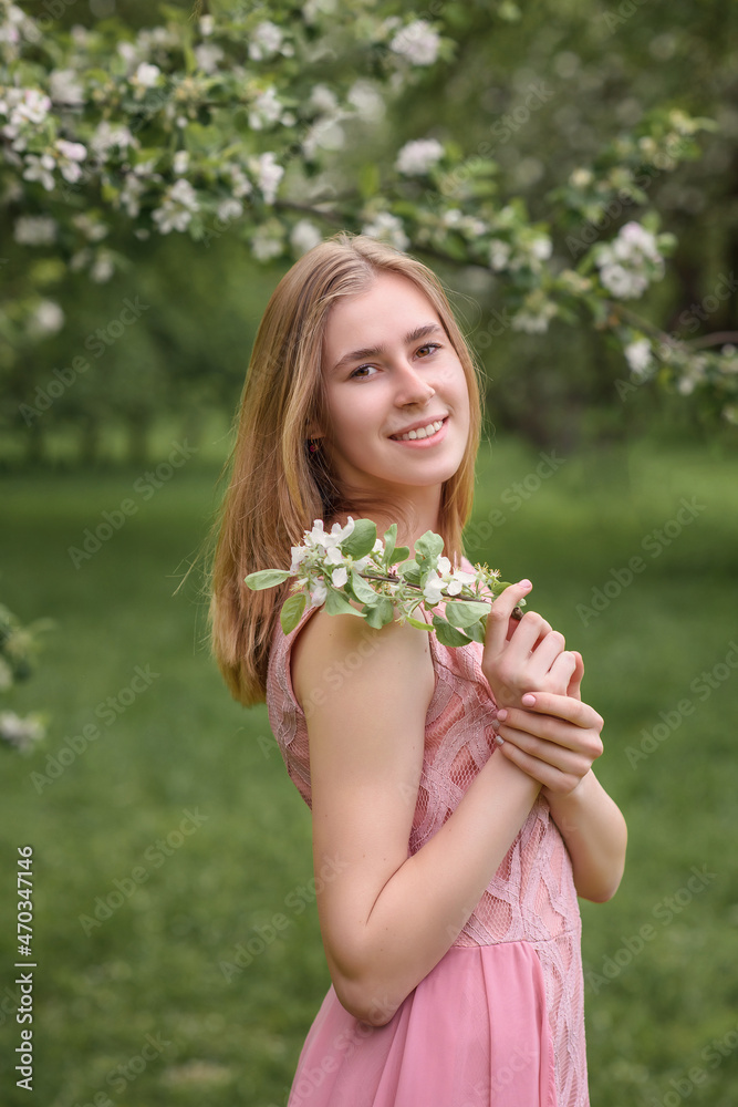 beautiful caucasian girl in blooming gardens beautiful caucasian girl in blooming gardens