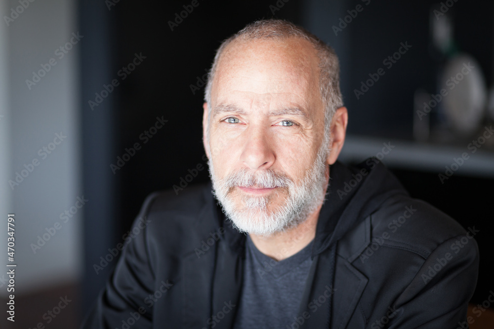 Serious Senior Man looking At The Camera. With a gray beard. Depression Serious Senior Man looking At The Camera. With a gray beard. Depression