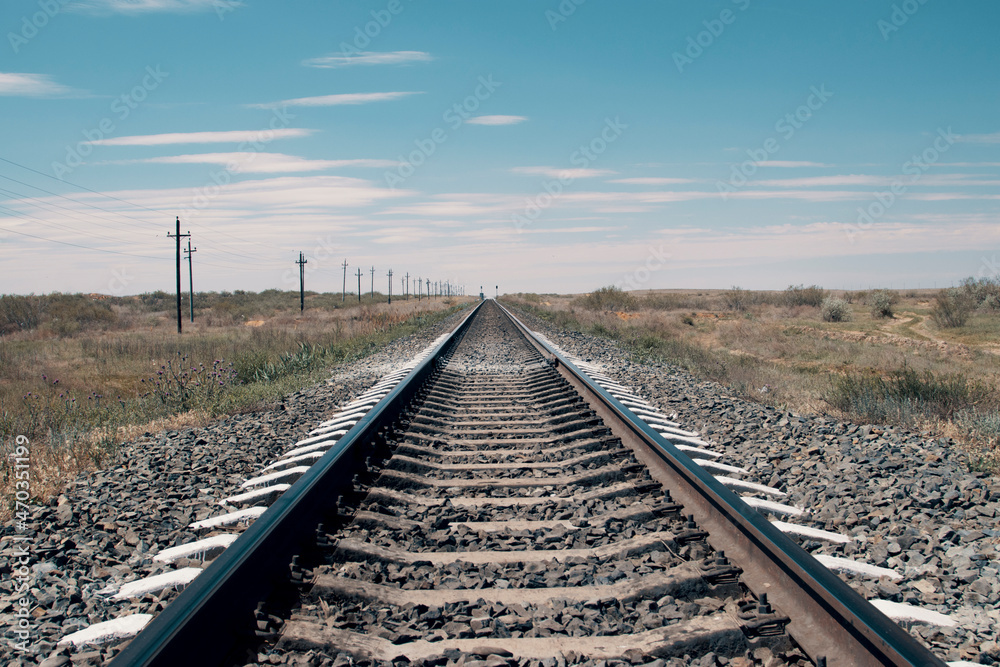 Railway rails in the desert. Horizontal photo. High quality photo Railway rails in the desert. Horizontal photo. High quality photo