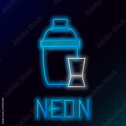 Glowing neon line Cocktail shaker with cocktail glass icon isolated on black background. Colorful outline concept. Vector