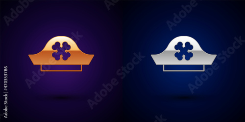 Gold and silver Pirate hat icon isolated on black background. Vector
