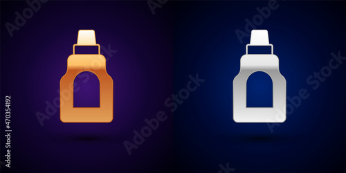 Gold and silver Plastic bottle for laundry detergent, bleach, dishwashing liquid or another cleaning agent icon isolated on black background. Vector