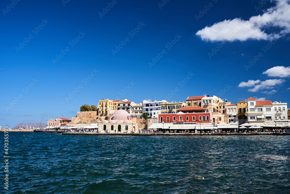 Historic mosque, houses and taverns in the port of Chania city