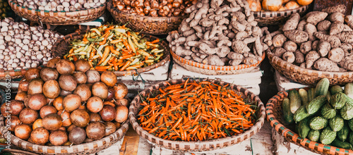 tropical spices and fruits sold at a local market in Hanoi (Vietnam)