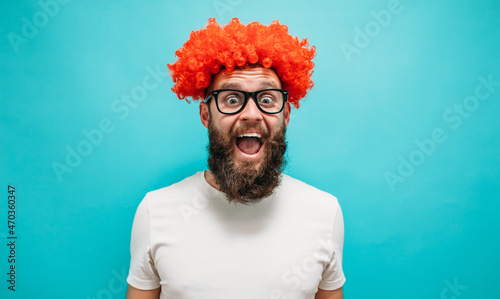Crazy hipster guy emotions. Collage in magazine style with happy emotions. Discount, sale, season sales. Colorful summer concept. A happy charismatic guy with red hair