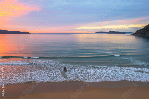 One hundred percent cloud covered sunrise over the sea