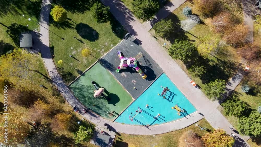 Top down aerial view of a playground for children in a public park