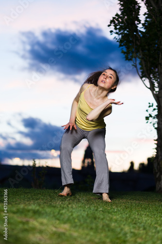 ballet ballerina dancer motion in happy joyful Rhythm . Hispanic woman healthy life outdoors 