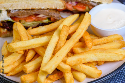 French Fries are also known as chips in some countries, made from potato and deep fried in hot oil.