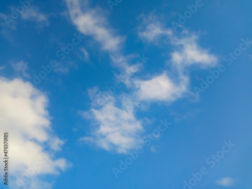 Sky and white clouds in the daytime as a background. © Wiwek