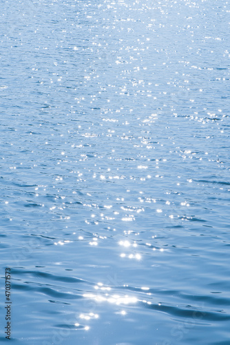 blue Surface water in the sunshine texture background