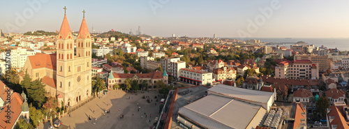 November 21, 2021 - Qingdao, China: Aerial view of St. Michael's Cathedral in Qingdao downtown