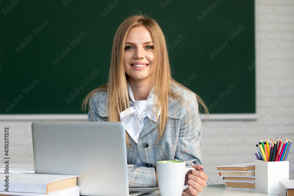 Portrait of happy female university student study lesson at school or university. Webinar e-learning at school, distance education. Portrait of happy female university student study lesson at school or university. Webinar e-learning at school, distance education.