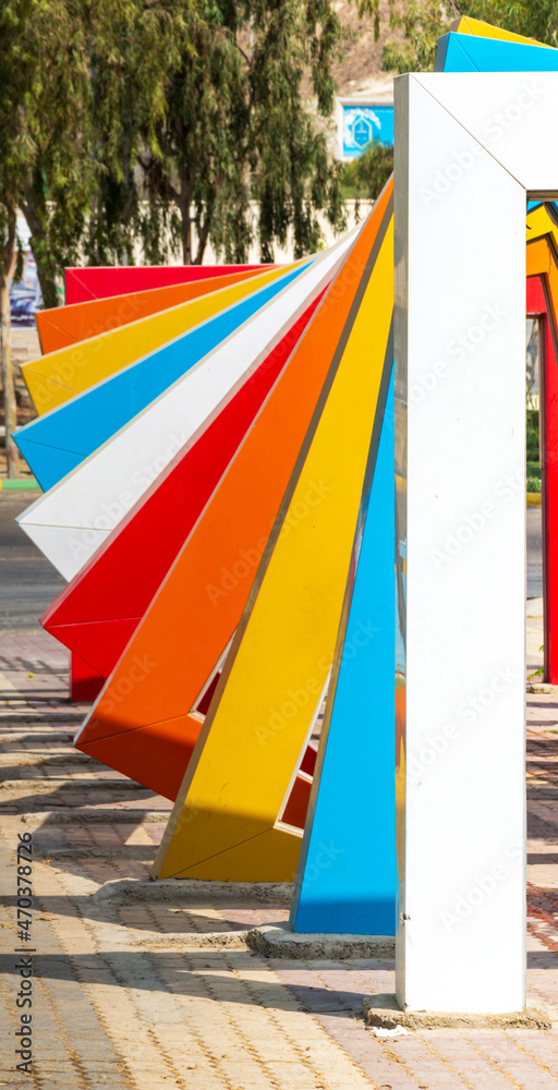 rainbow colored frame in the park, chabahar province, iran rainbow colored frame in the park, chabahar province, iran