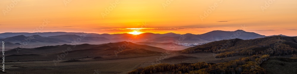 Beautiful mountain natural scenery at sunrise in autumn,Ulan Butong grassland scenery in Inner Mongolia,China.