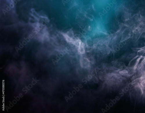 Abstract colorful smoke on black background. High quality photo
