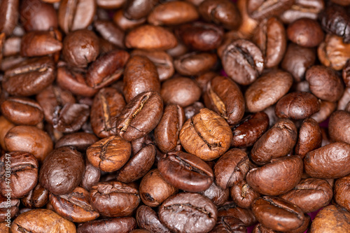 Brown coffee bean background. Macro close up.