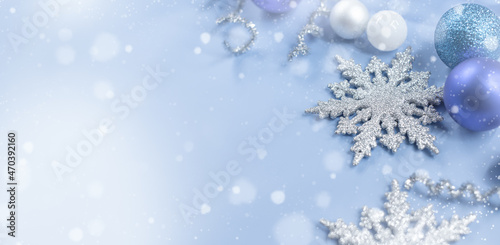 Silver Christmas gifts with snow background. silver decorations on pastel silver background. Flat lay, top view, Presents for Birthdays. Boxes with gifts tied with ribbon and bows. happy new year 2022