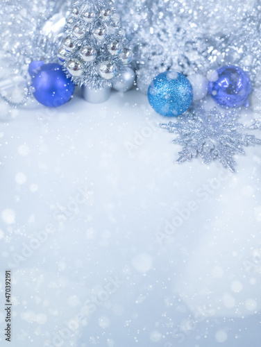 Silver Christmas gifts with snow background. silver decorations on pastel silver background. Flat lay, top view, Presents for Birthdays. Boxes with gifts tied with ribbon and bows. happy new year 2022